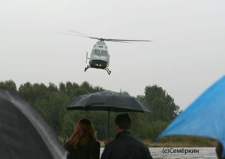 Helicopters in a rain
