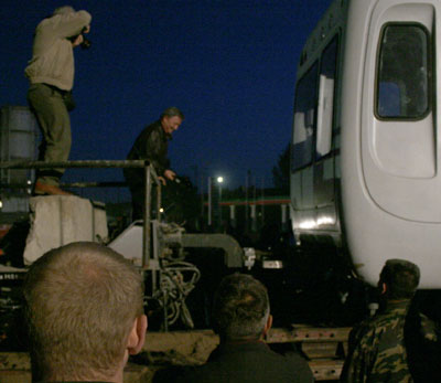 Исхаков разбивает бутылку шампанского о первый вагон казанского метро, прибывший в электродепо